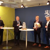 Kaiku-palkinnonjako. Kuvassa Juha Sarkio, Lasse Skog, Frank Österlund ja Janne Leskinen